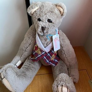 Authentic one of a kind teddy bear.